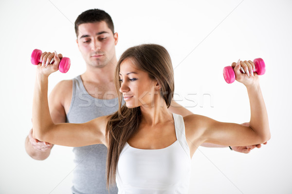 Personal Trainer Assisting A Client Stock photo © MilanMarkovic78