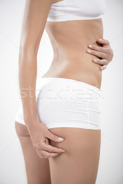 Cuerpo perfecto primer plano celulitis nalga mujer Foto stock © MilanMarkovic78