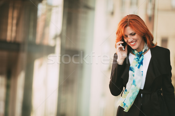 Happy Businesswoman After A Successful Meeting Stock photo © MilanMarkovic78