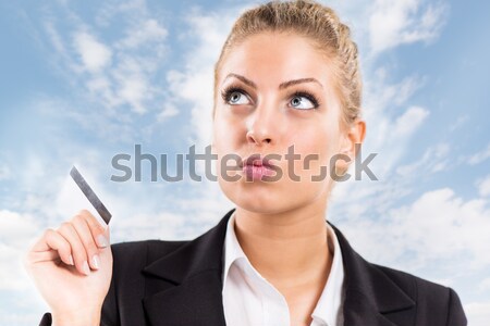 Businesswoman with master card Stock photo © MilanMarkovic78