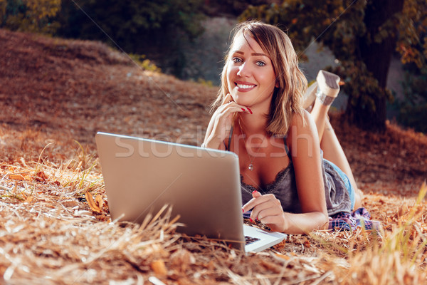 Cute Girl With Laptop Stock photo © MilanMarkovic78