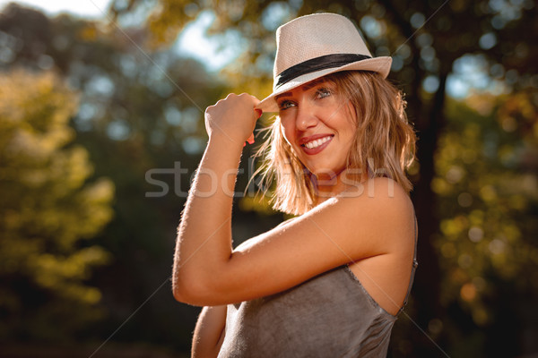 Happy Girl With Hat Stock photo © MilanMarkovic78