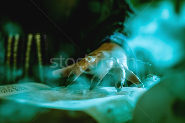 Kéz mágikus könyv közelkép fekete körmök Stock fotó © MilanMarkovic78
