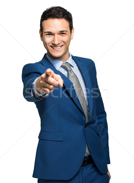 Portrait of young businessman pointing finger at viewer Stock photo © Minervastock