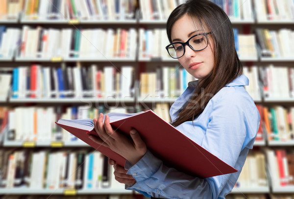 Portrait of a smiling student in a library Stock photo © Minervastock