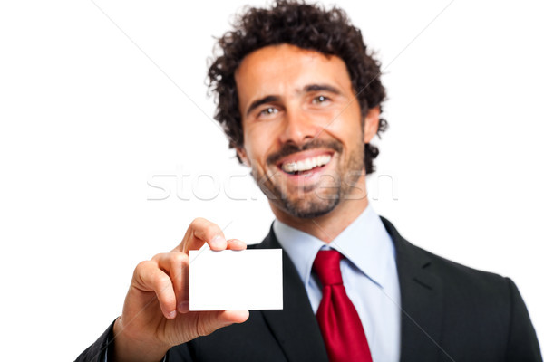 Business man handing a blank business card Stock photo © Minervastock