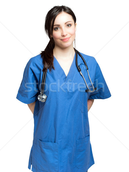 Close-up portrait of a female doctor smiling Isolated on white background. Stock photo © Minervastock