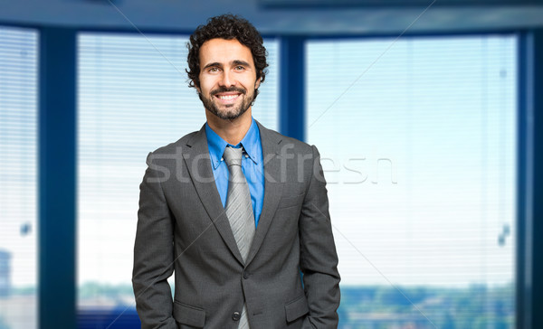 Handsome male manager in his office Stock photo © Minervastock