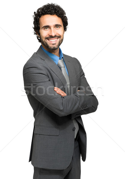 Portrait of a handsome businessman isolated on white Stock photo © Minervastock