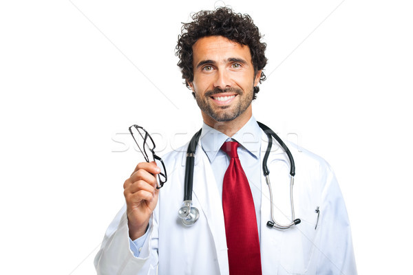 Oculist giving you a pair of glasses Stock photo © Minervastock