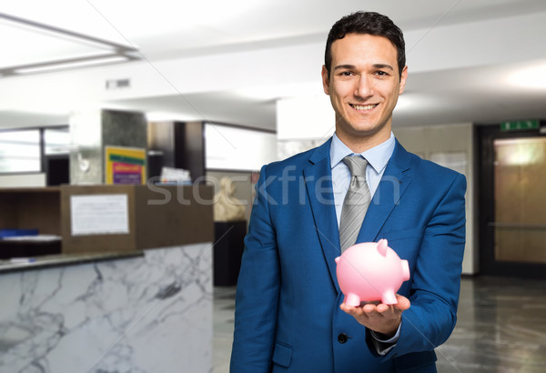 Zakenman spaarvarken man vak financieren Stockfoto © Minervastock