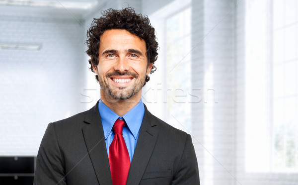 Gut aussehend Geschäftsmann Büro Business Lächeln glücklich Stock foto © Minervastock