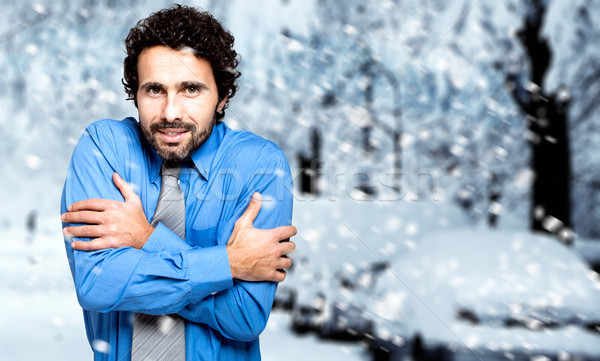 Portrait of a frozen businessman in the cold winter Stock photo © Minervastock