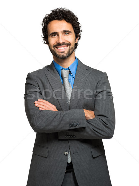 Portrait of a handsome businessman isolated on white Stock photo © Minervastock