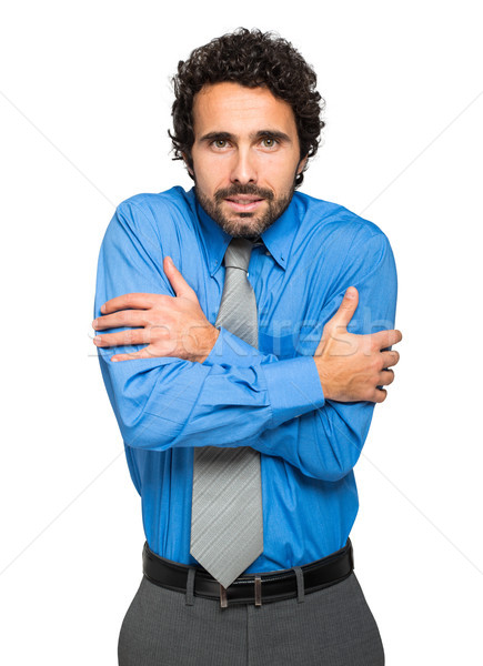 Stock photo:     Portrait of a freezing businessman 