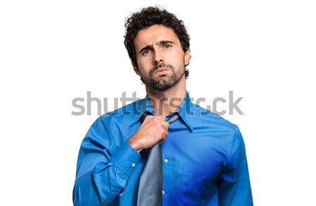Sweating businessman due to hot climate Stock photo © Minervastock