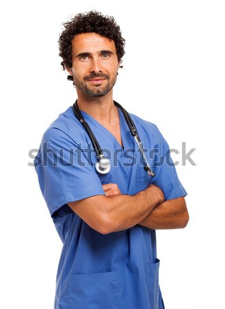 Portrait of a smiling handsome doctor Stock photo © Minervastock