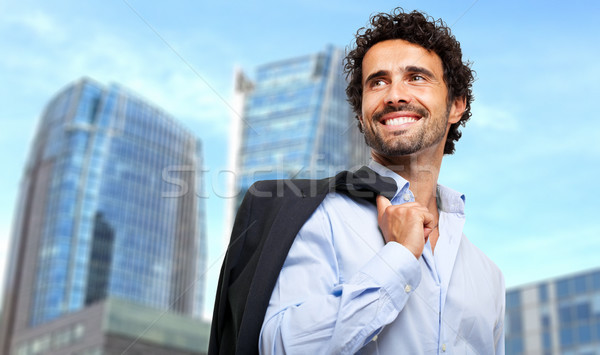 Stockfoto: Glimlachend · zakenman · jas · outdoor · hemel