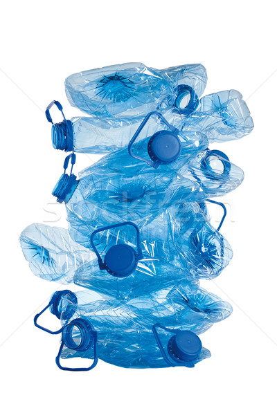 stack of used  blue plastic bottles isolated on white background Stock photo © MiroNovak
