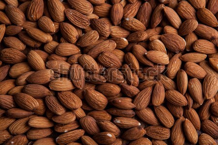 large grains of almonds in the shell and the bag Stock photo © mizar_21984