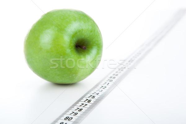 green apple with a ruler Stock photo © mizar_21984