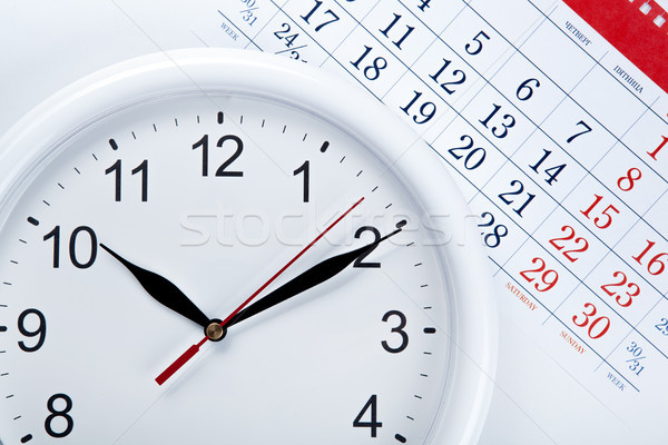 clock face and calendar sheet with numbers Stock photo © mizar_21984