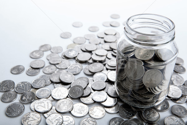 bank with coins and counting Stock photo © mizar_21984