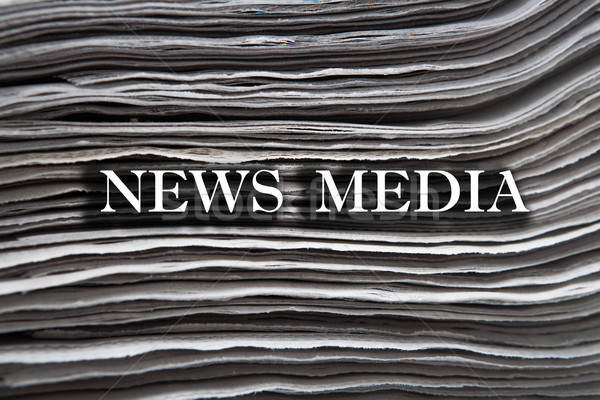 Stock photo: stack of newspapers closeup