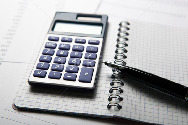 work on the calculator and papers Stock photo © mizar_21984