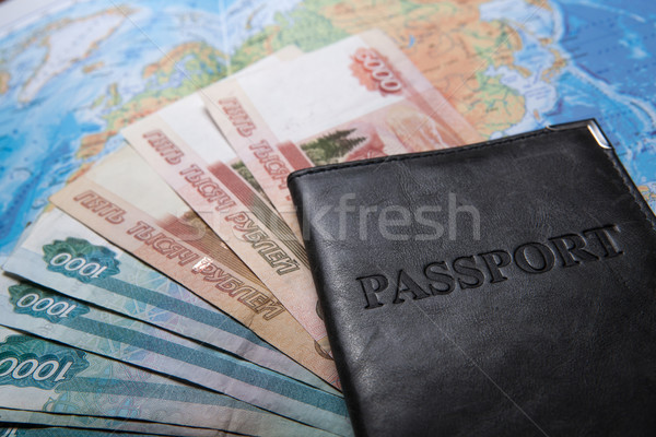 passport in the bag on a map with bank notes Stock photo © mizar_21984
