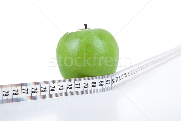 green apple with a ruler Stock photo © mizar_21984