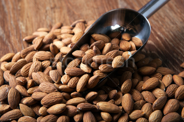 handful of almonds and scoop Stock photo © mizar_21984