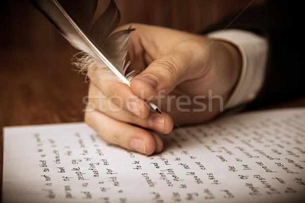 Stock photo: writer writes a fountain pen on paper work