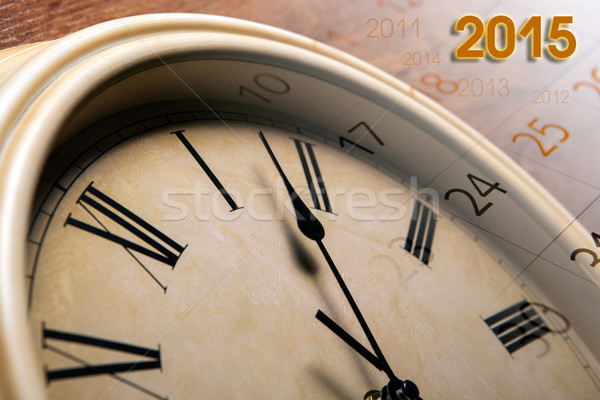 faceclock and sheet of a calendar with the number of days Stock photo © mizar_21984