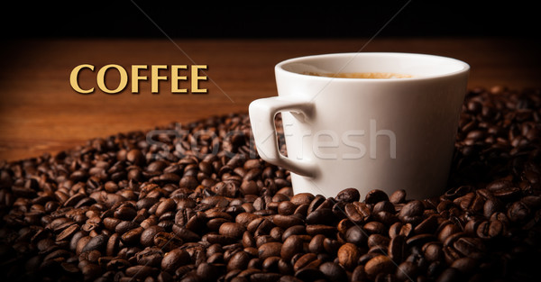 cup of black coffee with roasted coffe beans with title coffee  Stock photo © mizar_21984