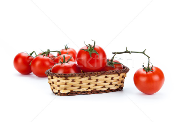 Czerwony pomidory mały koszyka biały tle Zdjęcia stock © mizar_21984