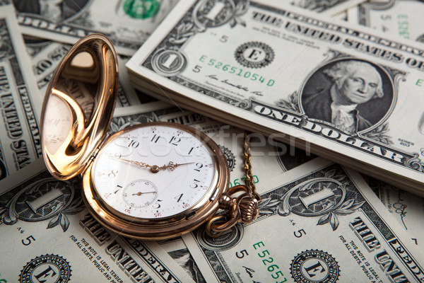 gold watch and dollar bills Stock photo © mizar_21984
