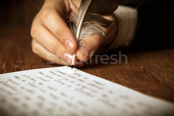 Stock photo: writer writes a fountain pen on paper work