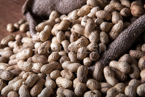 large grains of peanuts in the shell and the bag Stock photo © mizar_21984