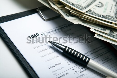 filling tax return on desktop Stock photo © mizar_21984
