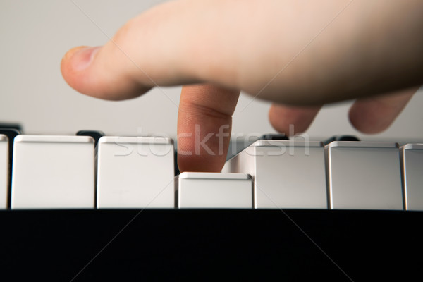 клавиши пианино человека пальца музыку человека Сток-фото © mizar_21984