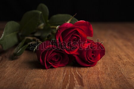 Stock photo: still life of a fountain pen, paper and flowers roses