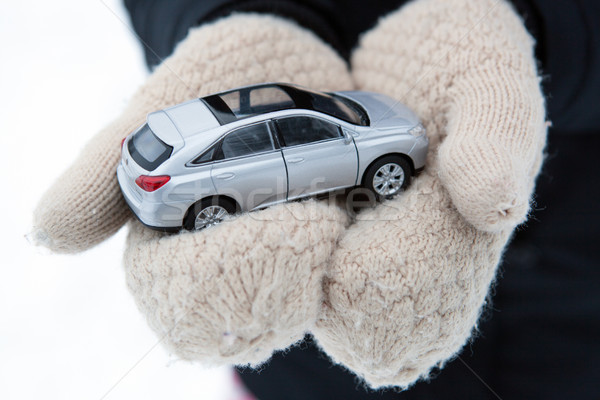 girl holds in her hands model of car Stock photo © mizar_21984