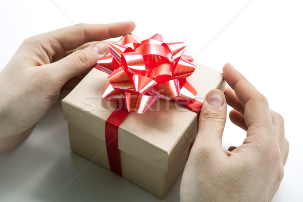 Man's hands give you a gift box Stock photo © mizar_21984