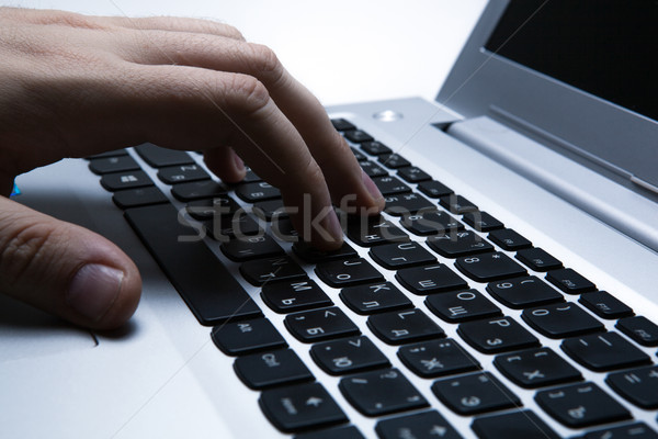 Stock fotó: Férfi · dolgozik · számítógép · gépel · laptop · billentyűzet · üzlet