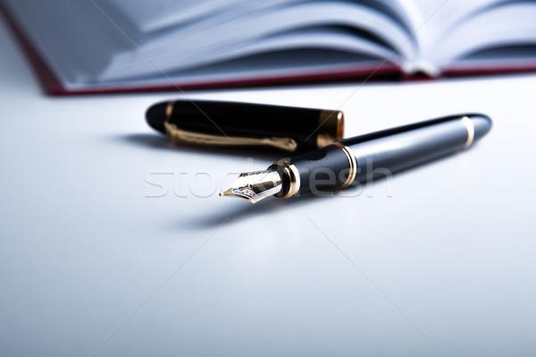Napló töltőtoll fehér közelkép toll notebook Stock fotó © mizar_21984
