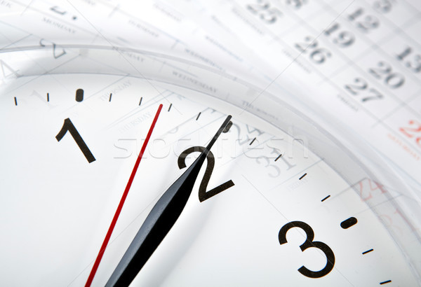 wall calendar with the number of days and clock Stock photo © mizar_21984