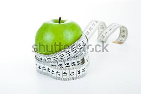 green apple with a ruler Stock photo © mizar_21984