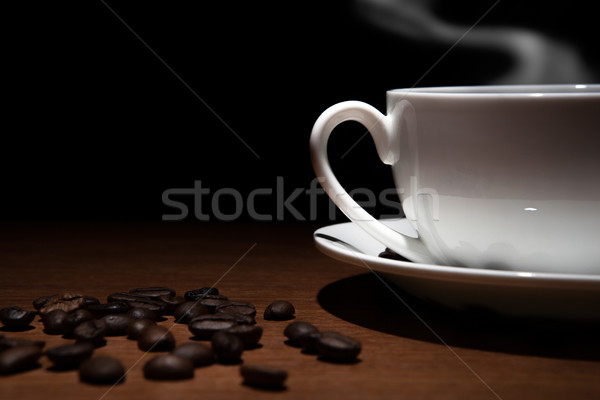 Cup chicchi di caffè tavola tavolo in legno nero alimentare Foto d'archivio © mizar_21984