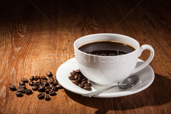 Cup caffè nero chicchi di caffè alimentare Foto d'archivio © mizar_21984